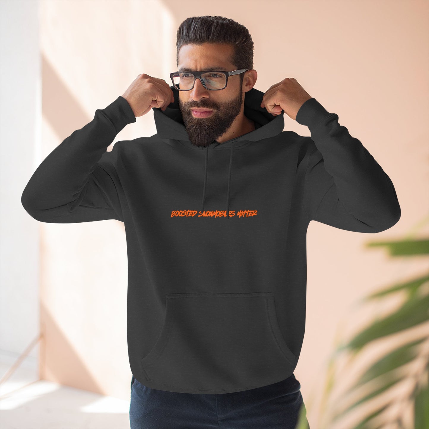 Man wearing BOOSTED SNOWMOBILES MATTER hoodie - funny snowmobile gift for riders