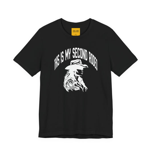 Black This Is My Second Rodeo cowgirl t-shirt with hand-drawn western graphic and cheeky slogan on front