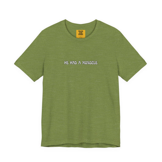 Green t-shirt with text 'HE HAD A MONOCLE' on a white background