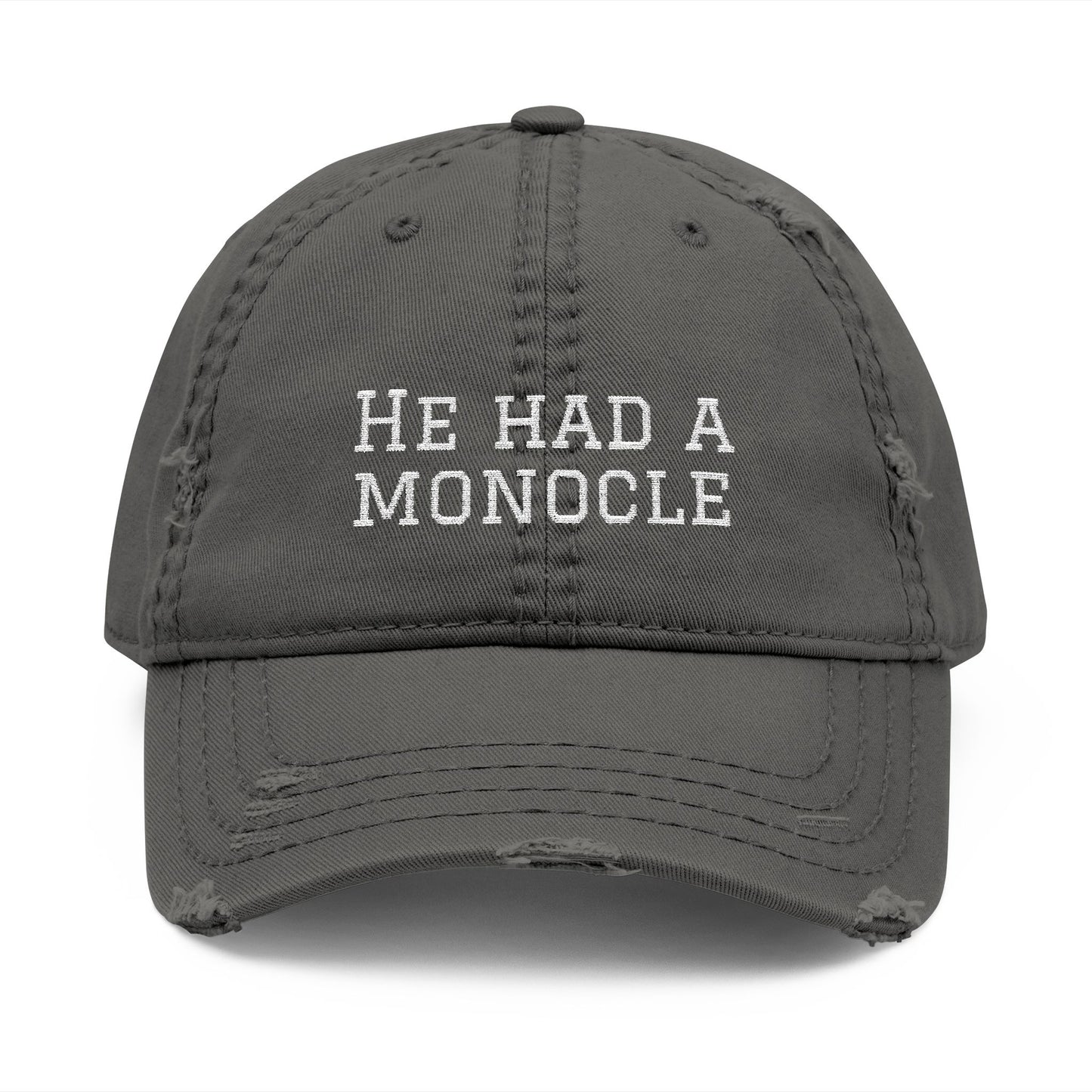 Gray cap with 'He Had a Monocle' text on a white background