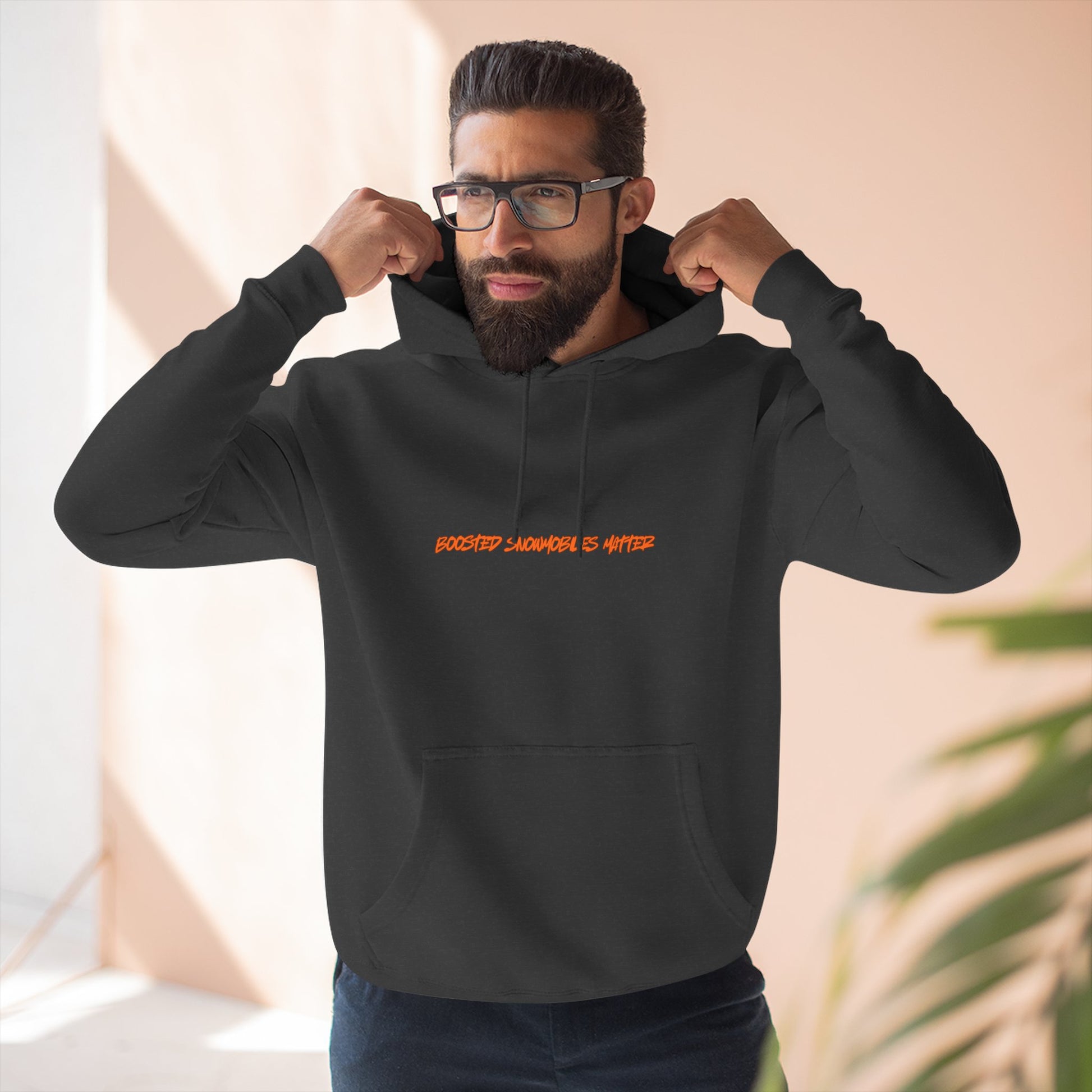 Man wearing BOOSTED SNOWMOBILES MATTER hoodie - funny snowmobile gift for riders