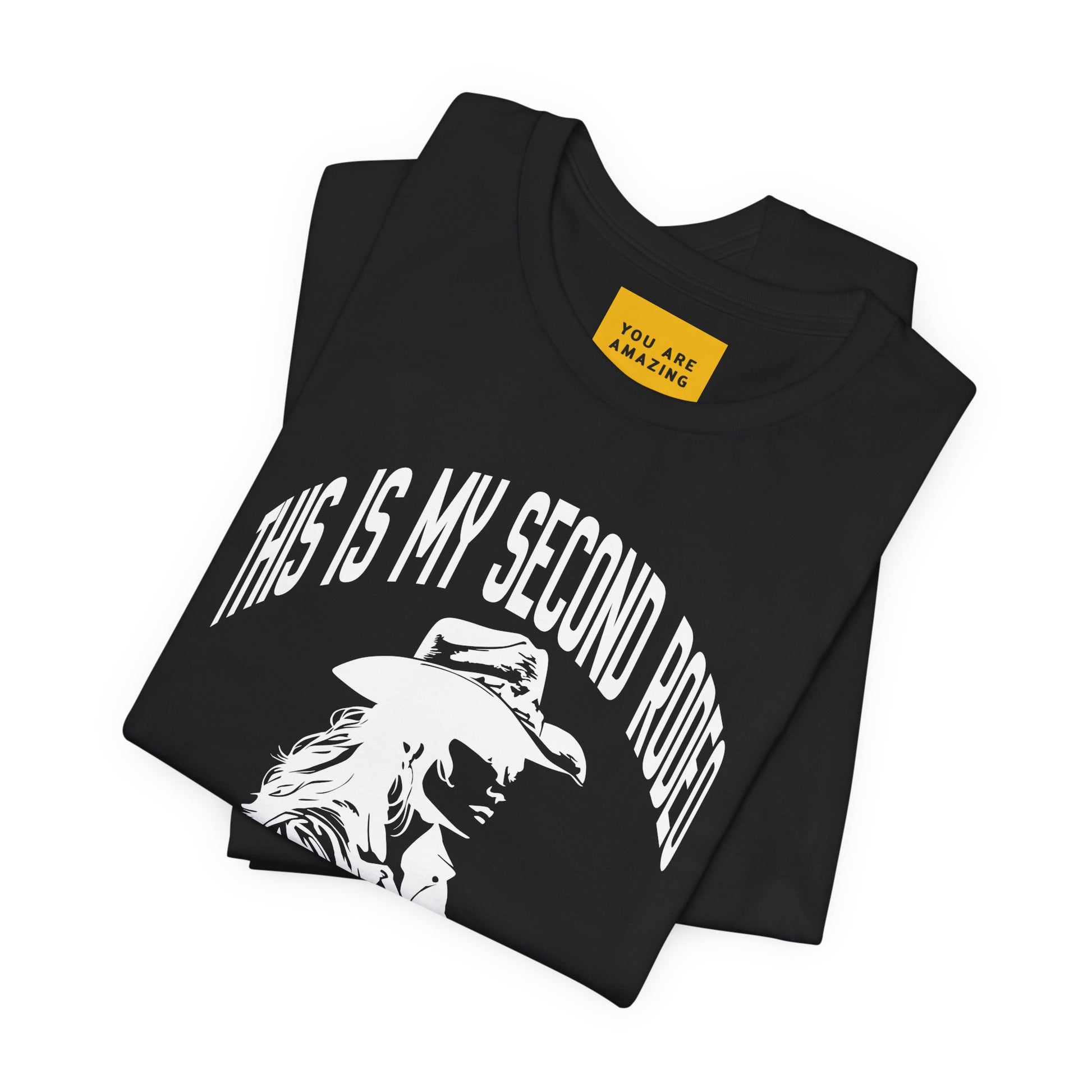 Folded This Is My Second Rodeo t-shirt showing neck label with hidden message 'you are amazing'