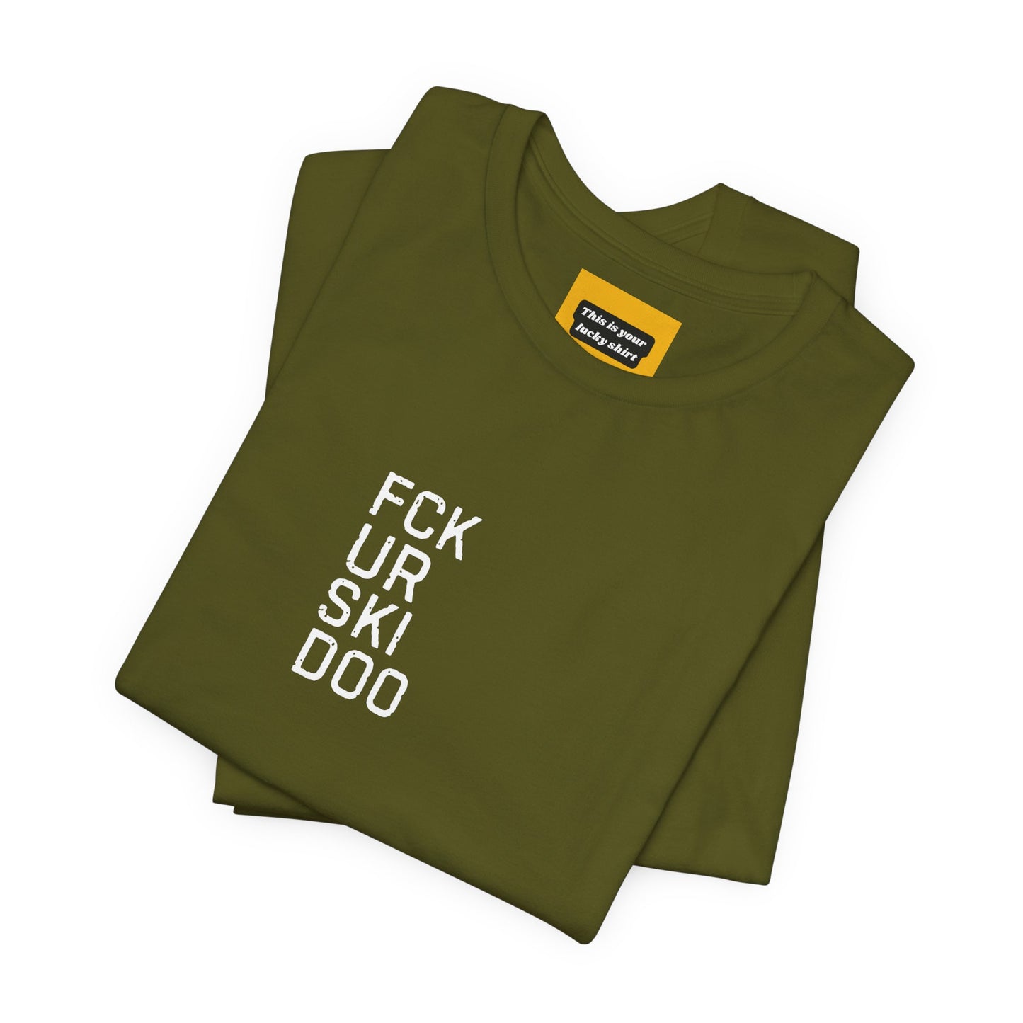 Folded green FCKURSKIDO graphic tee - funny snowmobile brand rivalry Arctic Cat Polaris Yamaha shirt with THIS IS YOUR LUCKY SHIRT text on neck label close up