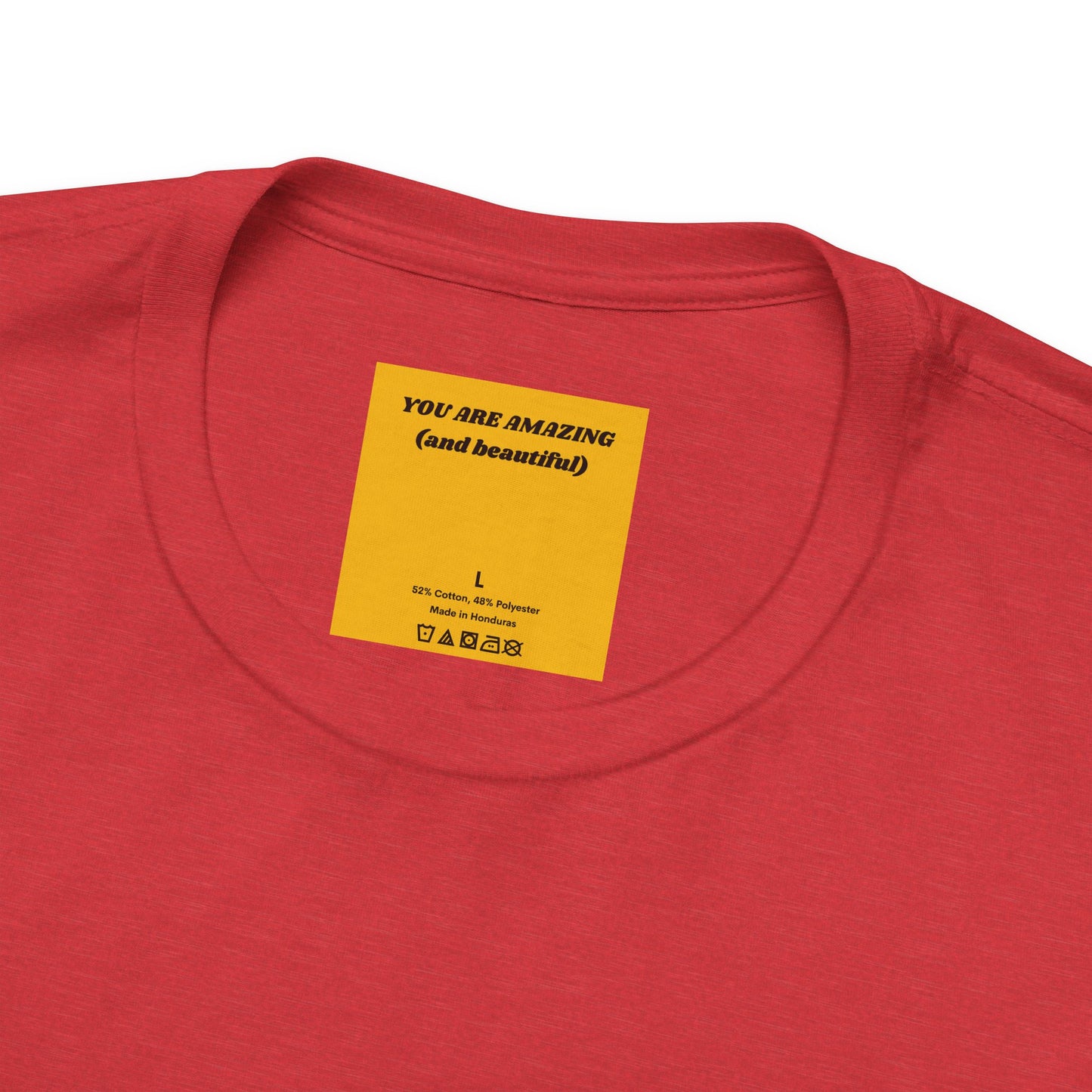 Red t-shirt with a yellow label text reads you are amazing and beautiful on the collar