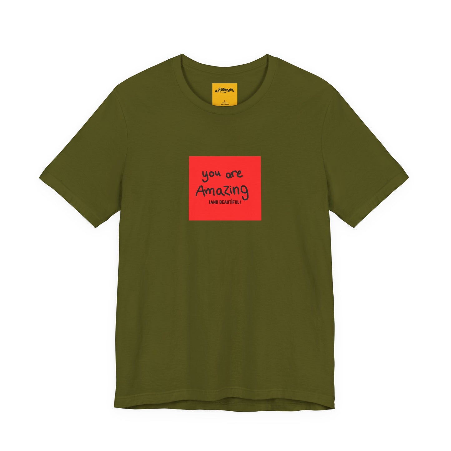 army green t-shirt with a red square and text  reads you are amazing and beautiful on a white background