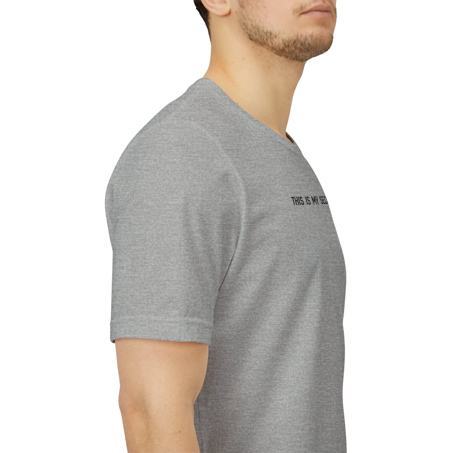 man wearing This Is My Second Rodeo western cowboy cowgirl t-shirts in heather grey, casual rodeo apparel, side view