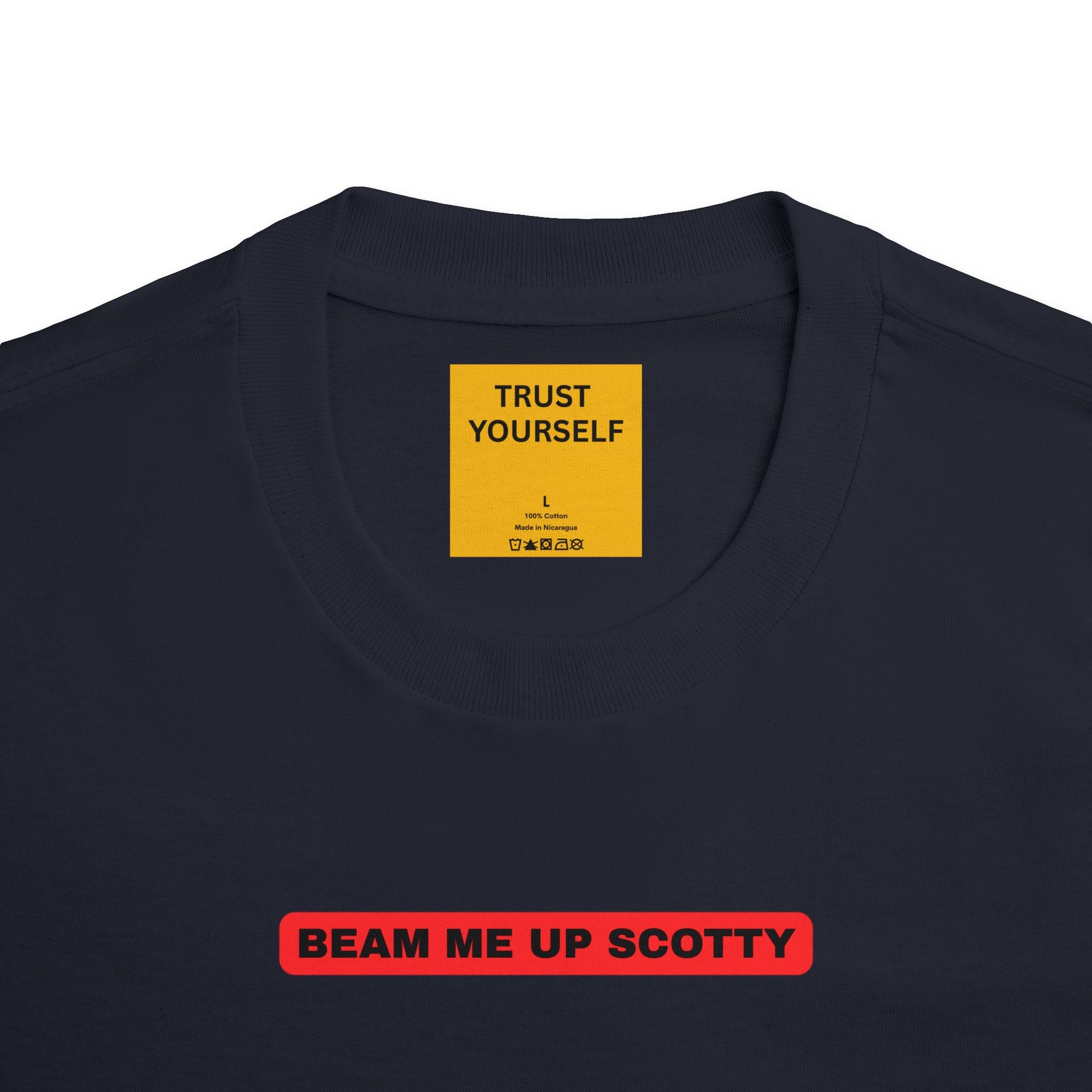 Close-up of hidden neck label message reading 'Trust Yourself' on black Beam Me Up Scotty Mandela Effect t-shirt