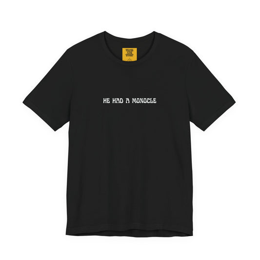 Black t-shirt with white text 'HE HAD A MONOCLE' on a white background